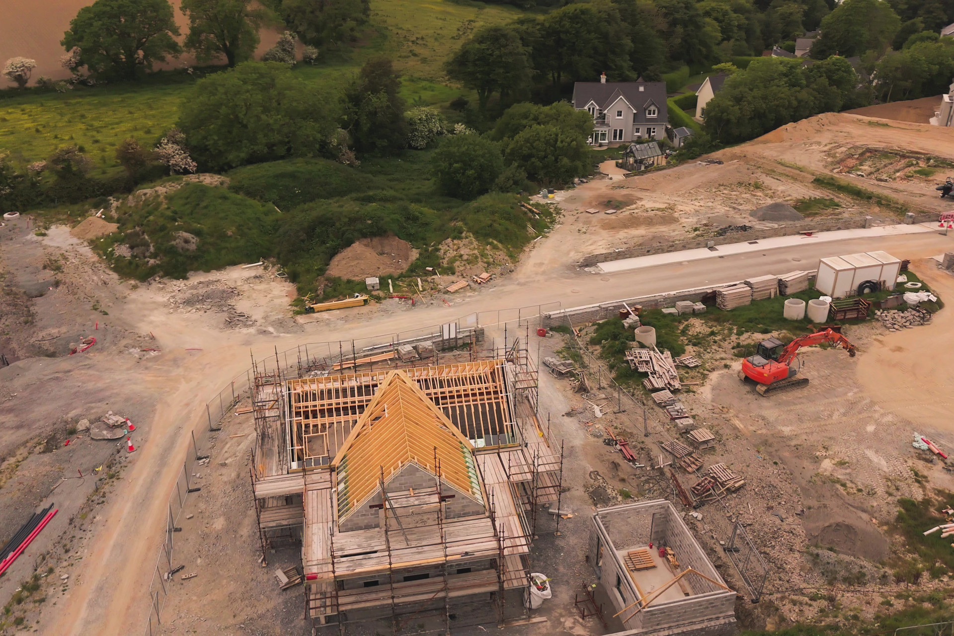 Enterprise drone surveying a commercial roof at dusk in Ireland